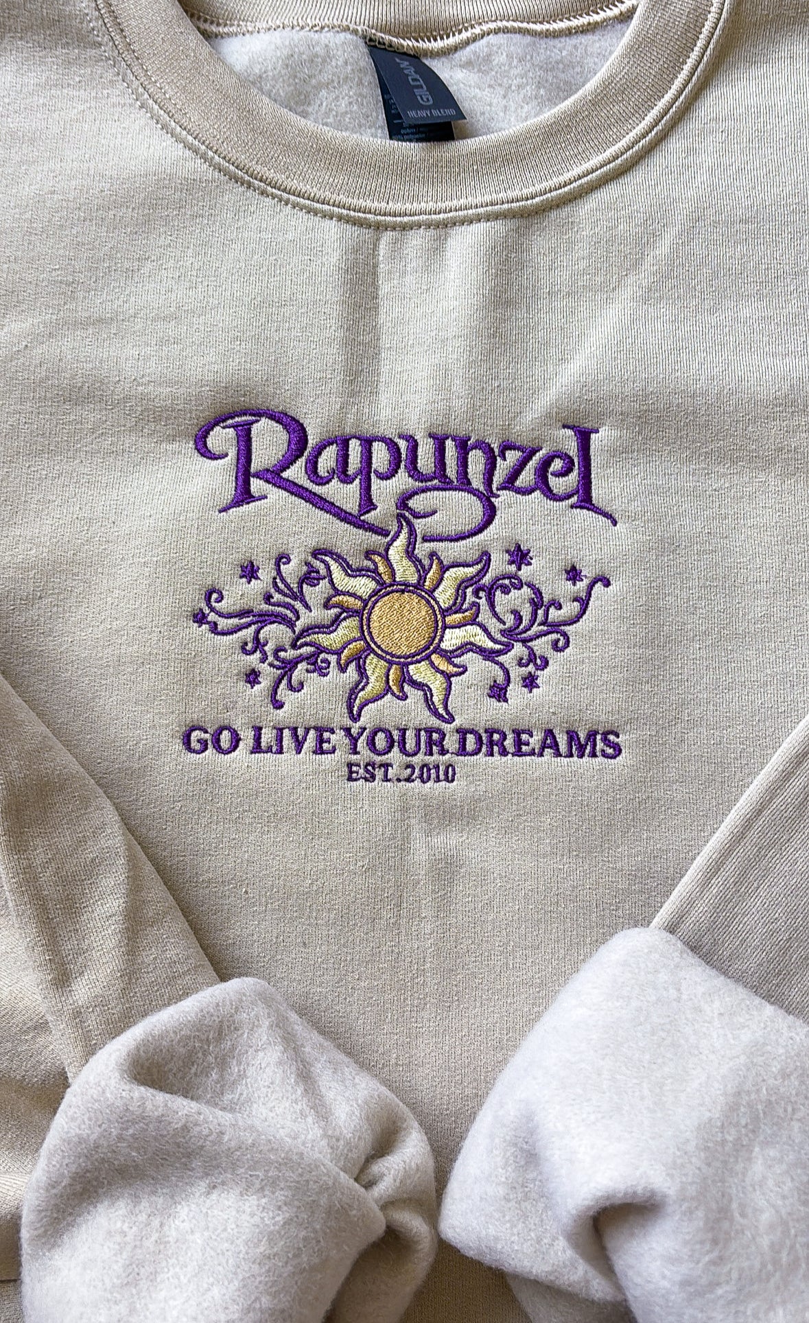 Go Live Your Dreams
Rapunzel-inspired embroidered sweatshirt